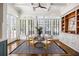 Dining area boasts a coffered ceiling, large windows and a built-in hutch at 513 Saint Charles Ne Ave, Atlanta, GA 30308