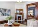 Cozy living room featuring a fireplace, modern furniture, and hardwood floors at 513 Saint Charles Ne Ave, Atlanta, GA 30308