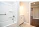 Bathroom featuring a shower-tub combo and vanity at 223 Villa Park Cir, Stone Mountain, GA 30087