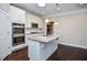 Contemporary kitchen with stainless steel appliances, granite countertops, and ample cabinet space, designed for functionality at 223 Villa Park Cir, Stone Mountain, GA 30087