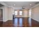 Spacious living room boasting hardwood floors, a cozy fireplace, and access to outdoor light, for a relaxing atmosphere at 223 Villa Park Cir, Stone Mountain, GA 30087