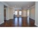 Bright living room with hardwood floors, natural light, fireplace and crown moulding at 223 Villa Park Cir, Stone Mountain, GA 30087