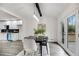 Dining area with modern lighting, a view of the deck, and kitchen access at 2412 Renny Ct, Marietta, GA 30066