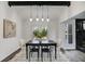 Modern dining room featuring stylish seating, contemporary lighting, and neutral decor at 2412 Renny Ct, Marietta, GA 30066