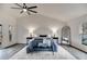 Bright main bedroom with vaulted ceiling, ceiling fan, and bench at the foot of the bed at 2412 Renny Ct, Marietta, GA 30066