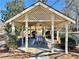 Community gazebo featuring a picnic table, perfect for outdoor gatherings and relaxation at 3533 Mulberry Way, Duluth, GA 30096