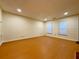 Empty living room with wood floors and natural light at 3533 Mulberry Way, Duluth, GA 30096