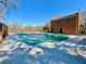 Community pool covered for the winter, featuring a brick building and a fence at 3533 Mulberry Way, Duluth, GA 30096