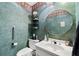 Stylish half-bathroom featuring unique wall texture, a round mirror, and a modern sink at 1165 Saint Ives Ct, Suwanee, GA 30024
