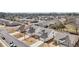 Aerial view of a neighborhood featuring well-maintained homes, manicured lawns, and tree-lined streets on a sunny day at 2764 Bateman Sw St, Powder Springs, GA 30127