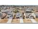 Aerial view of a neighborhood featuring well-maintained homes, manicured lawns, and tree-lined streets on a sunny day at 2764 Bateman Sw St, Powder Springs, GA 30127
