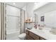 Clean bathroom featuring a shower-tub combo and modern vanity at 2764 Bateman Sw St, Powder Springs, GA 30127