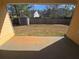 A large backyard with a storage shed as seen from a covered patio at 3121 Baywood Ct, Conyers, GA 30013