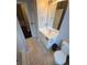 Bathroom with large mirror, white vanity, and commode at 3121 Baywood Ct, Conyers, GA 30013