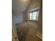 Neutral bedroom with large window and cozy carpet at 3121 Baywood Ct, Conyers, GA 30013