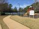 Tennis courts and playground inside this community at 3121 Baywood Ct, Conyers, GA 30013