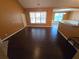 Spacious living room with hardwood floors and abundant natural light at 3121 Baywood Ct, Conyers, GA 30013