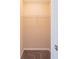 A small carpeted closet with a wire shelf offering efficient storage at 433 Kara Ln, Mcdonough, GA 30253