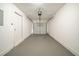 Empty garage with automatic door and white walls at 433 Kara Ln, Mcdonough, GA 30253