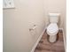 A cozy toilet room with a classic white toilet and modern fixtures at 433 Kara Ln, Mcdonough, GA 30253