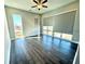 Bright bedroom featuring hardwood floors, recessed lighting and windows with shades at 827 Winslow Nw Way, Atlanta, GA 30318