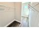 Spacious walk-in closet with custom shelving at 827 Winslow Nw Way, Atlanta, GA 30318