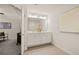 Luxurious main bathroom featuring double sinks, a large mirror, and plenty of counter space at 340 Sinclair Ct, Mcdonough, GA 30253