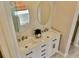 Bathroom featuring double sink vanity with modern fixtures and stylish mirrors at 3577 N Winds N Trl, Douglasville, GA 30135