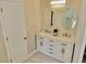 Bright bathroom featuring a double vanity, modern lighting, and sleek fixtures at 3577 N Winds N Trl, Douglasville, GA 30135