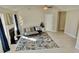 Cozy living room featuring a modern fireplace, stylish rug, and contemporary light fixture at 3577 N Winds N Trl, Douglasville, GA 30135