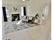 Bright living room with light wood floors, fireplace, and large windows with natural light at 3577 N Winds N Trl, Douglasville, GA 30135