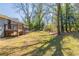 A deck overlooks a large backyard with mature trees at 3761 Turner Heights Dr, Decatur, GA 30032
