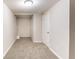 Finished basement featuring neutral carpet, lighting, and closet space at 3761 Turner Heights Dr, Decatur, GA 30032