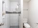 Modern bathroom featuring a tiled shower with mosaic accents at 3761 Turner Heights Dr, Decatur, GA 30032