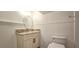 Bathroom with granite countertops, white cabinets, and large mirror at 4875 Gladstone Pkwy, Suwanee, GA 30024