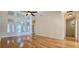 Open-concept living room boasts large windows, hardwood floors, and high ceilings at 4875 Gladstone Pkwy, Suwanee, GA 30024