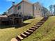 A view of the backyard, patio, and multilevel deck offers a great place to relax and enjoy the outdoors at 2785 Old Sewell Rd, Marietta, GA 30068