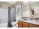 Traditional bathroom with shower-tub combo and a marble countertop vanity at 2785 Old Sewell Rd, Marietta, GA 30068