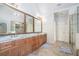 Elegant bathroom featuring granite countertops, dual sinks, and a glass-enclosed shower at 2785 Old Sewell Rd, Marietta, GA 30068