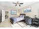 Cozy bedroom with a ceiling fan and natural light at 2785 Old Sewell Rd, Marietta, GA 30068