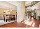 Spacious dining room featuring decorative columns, hardwood floors, and an elegant chandelier at 2785 Old Sewell Rd, Marietta, GA 30068