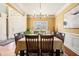 Formal dining room featuring hardwood floors, wainscoting, a chandelier, and ample seating at 2785 Old Sewell Rd, Marietta, GA 30068