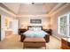 Spacious main bedroom features a trey ceiling and en-suite bathroom with tub at 2785 Old Sewell Rd, Marietta, GA 30068