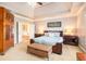 Spacious bedroom with tray ceilings and ensuite bathroom with a jacuzzi at 2785 Old Sewell Rd, Marietta, GA 30068