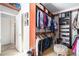 Spacious walk-in closet with custom shelving and ample storage for clothes and shoes at 2785 Old Sewell Rd, Marietta, GA 30068