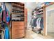 Walk-in closet featuring custom wooden shelves and drawers with ample storage at 2785 Old Sewell Rd, Marietta, GA 30068