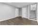 Hallway features wood-look flooring with a staircase at 353 Old Rosser Rd, Stone Mountain, GA 30087