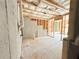 Unfinished basement space showing concrete walls and a framed area, prepped with utilities at 66 Pine Creek Ct, Dallas, GA 30157