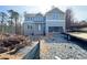 New construction of two-story home with an attached two-car garage at 66 Pine Creek Ct, Dallas, GA 30157