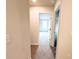 Hallway view showcasing a carpeted floor and doorways leading to other rooms at 66 Pine Creek Ct, Dallas, GA 30157